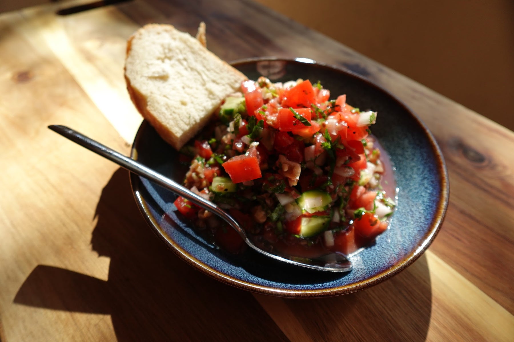 Gavurdağı salad — finely diced Turkish tomato salad with crushed walnuts, herbs, and pomegranate molasses
