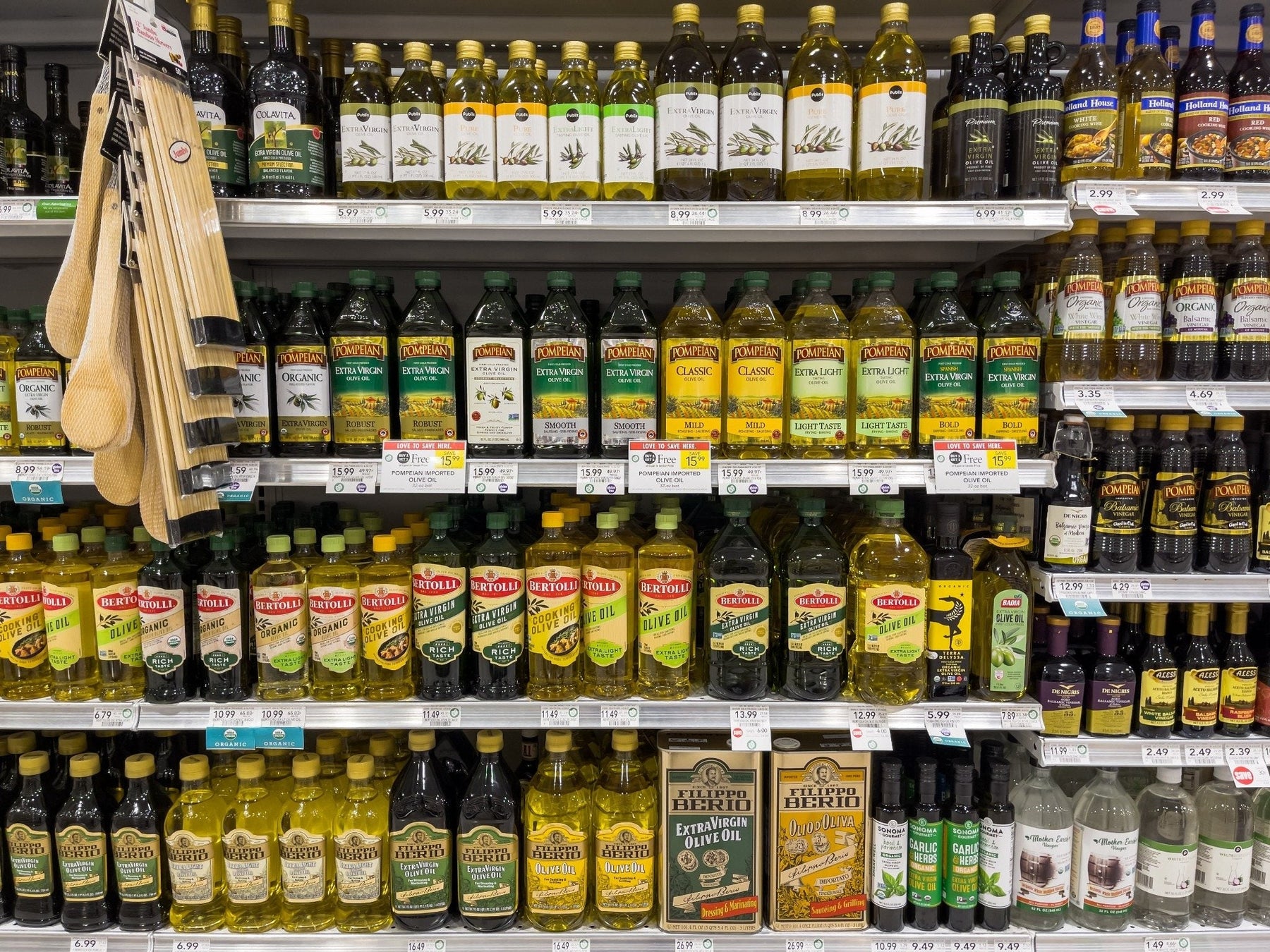 Grocery store olive oil shelf — the supermarket EVOO category where a 2010 UC Davis study found most bottles failed the international standard